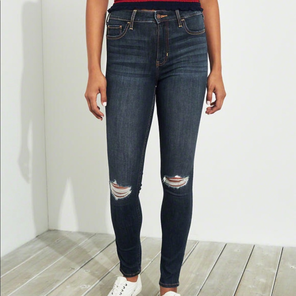 Hollister high waisted jean with ripped knee.